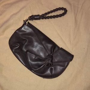 Unique mauve wristlet clutch with bow detail